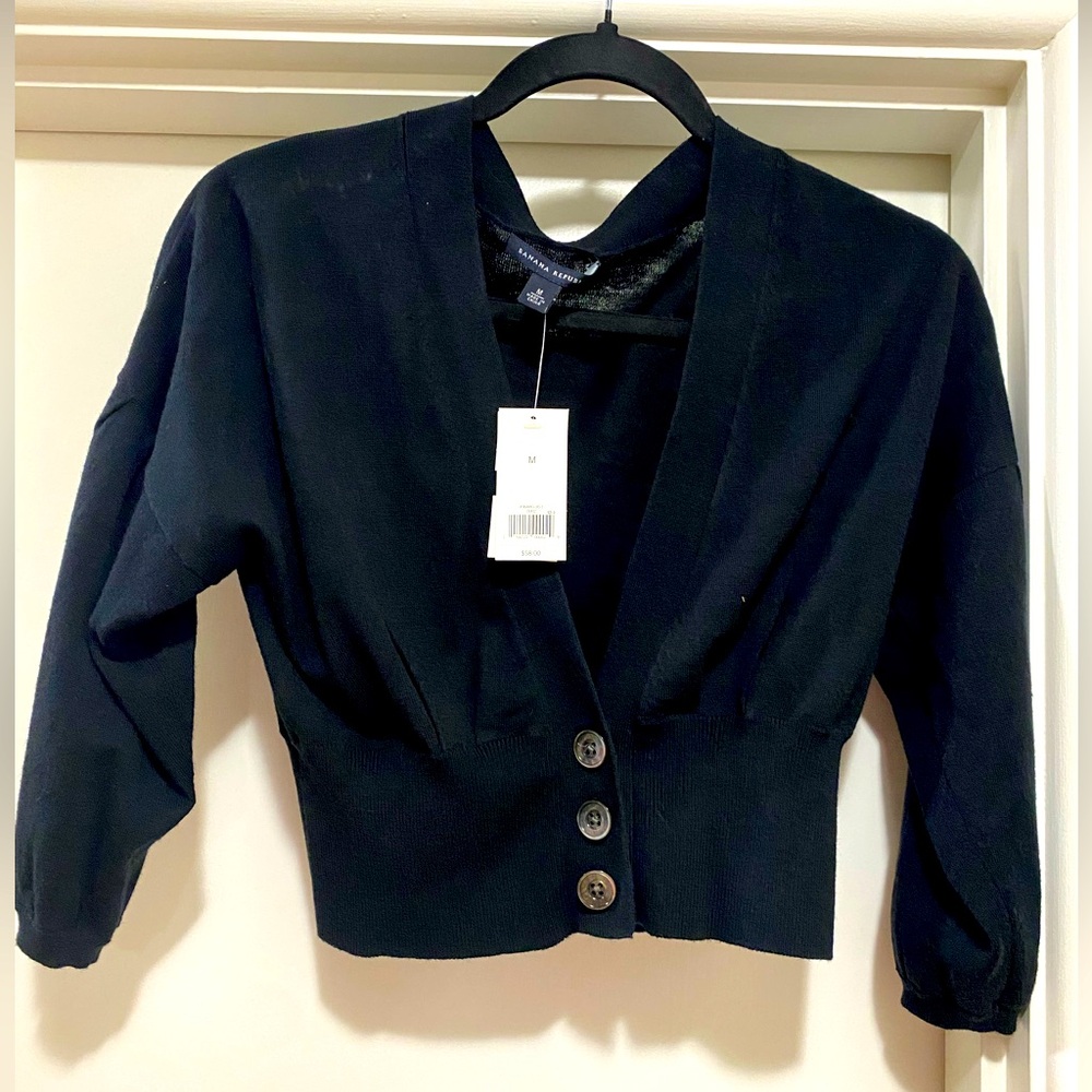 Women’s black shrug sweater